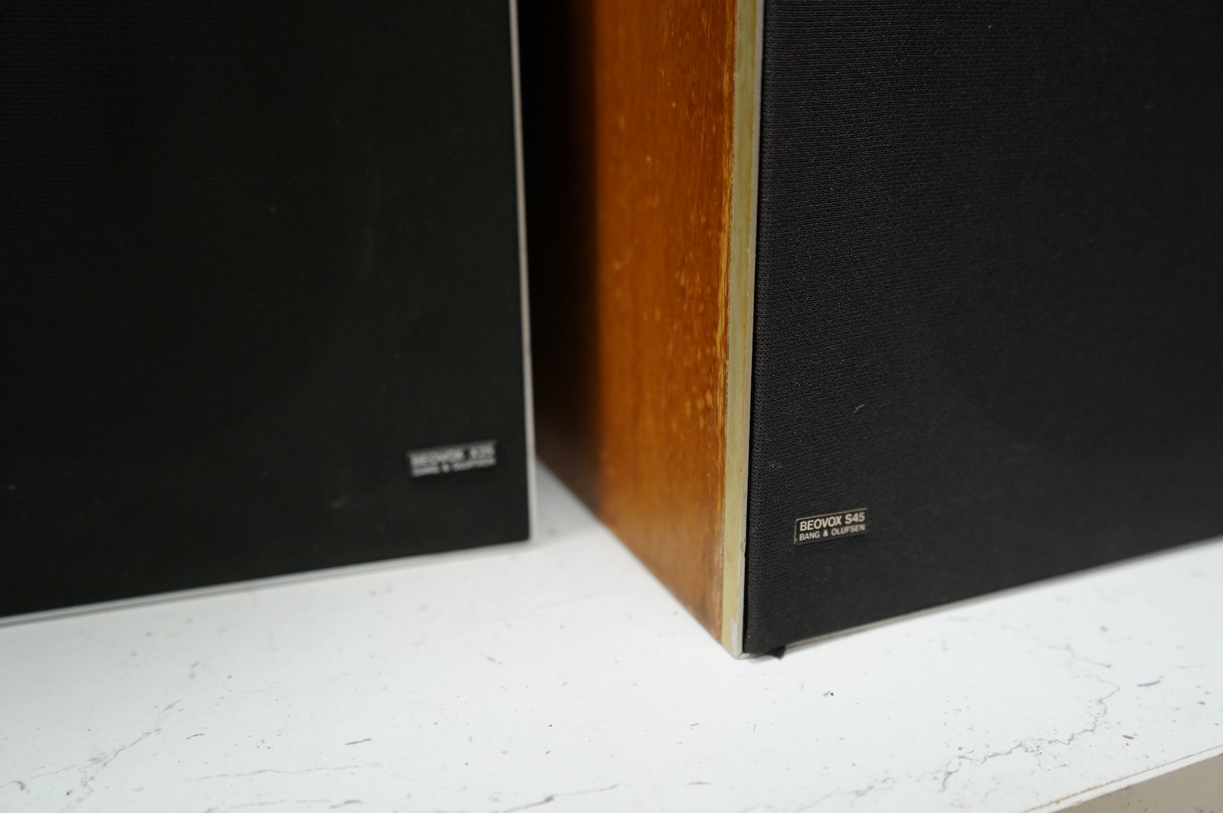 A collection of Bang & Olufsen stereo equipment, including; a Beocentre 2200 together with a pair of the related Beovox X25 speakers, plus a pair of Redline R60 floor standing speakers with their stands, and a pair of Be